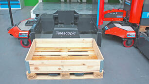 Automated loading: Tugger train load carrier with telescopic forks