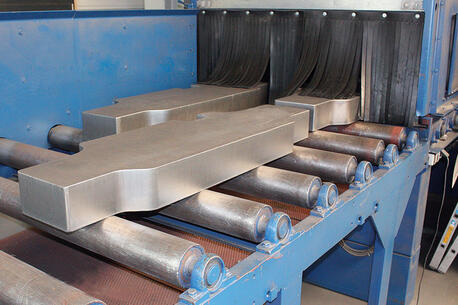 Sandblasting of sheet plates