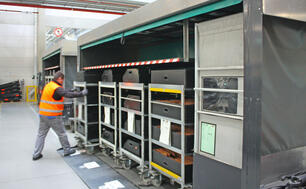 Lowering clearance and tow tractor locking